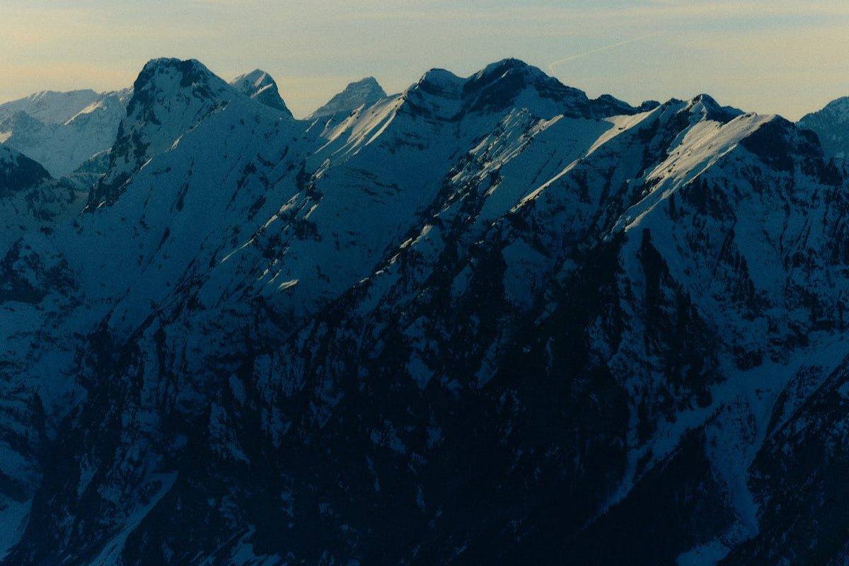 Snow-lit peaks above the treeline